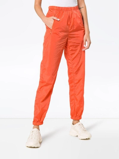 Shop Prada Elasticated Track Pant Trousers - Yellow