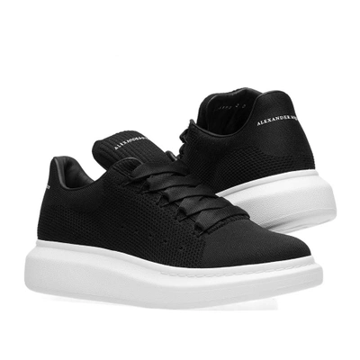 Shop Alexander Mcqueen Wedge Sole Knit Sneaker In Black
