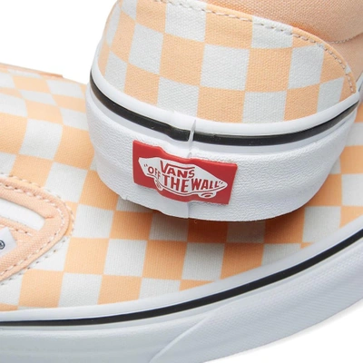 Shop Vans Classic Slip On Checkerboard In Orange