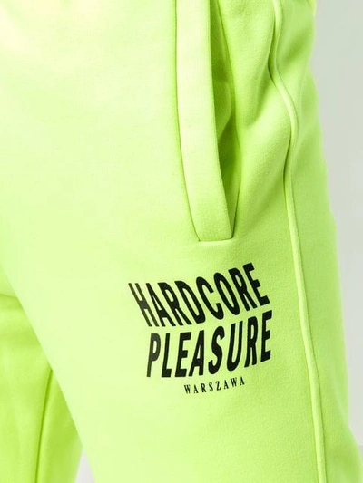 Shop Misbhv Hardcore Pleasure Track Pants - Yellow