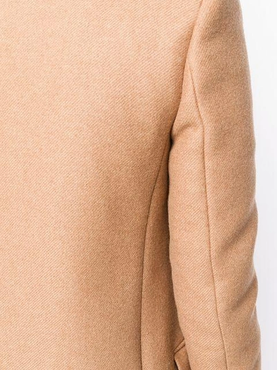 single-breasted buttoned coat
