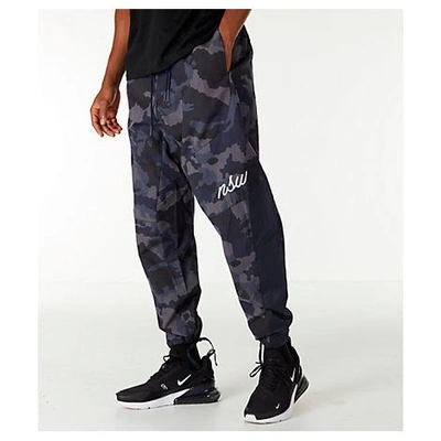 Shop Nike Men's Sportswear Camo Jogger Pants, Blue