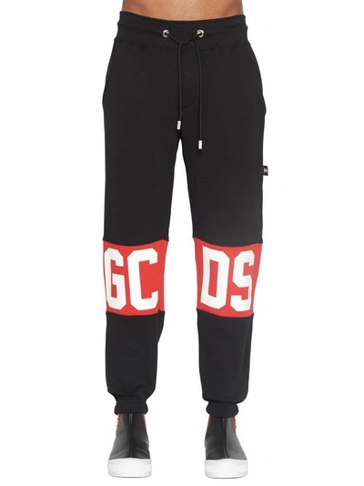 Shop Gcds Striped Track Pants In Black