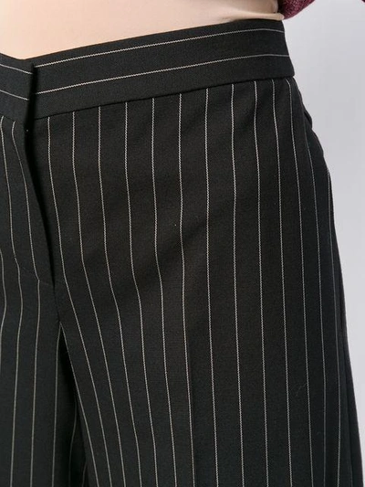 Shop Alexander Mcqueen Pinstripe Palazzo Trousers In Black