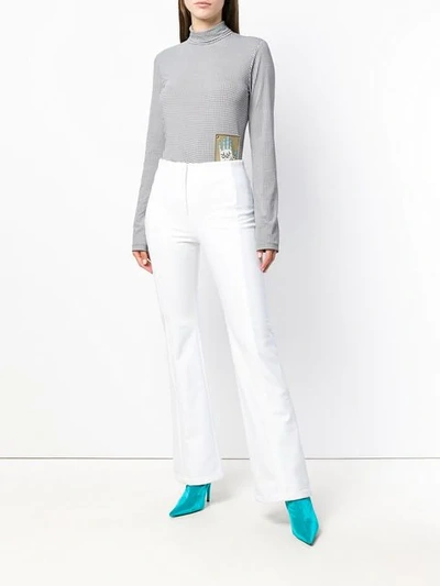 Shop Fendi High-waisted Slim Trousers In White