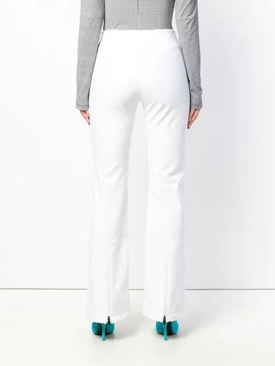 high-waisted slim trousers