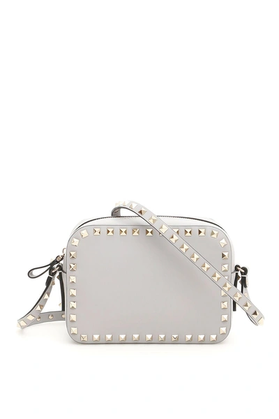 Shop Valentino Rockstud Crossbody Bag In Pastel Grey