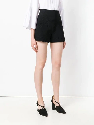 Shop Alexander Mcqueen Floral Embossed Shorts - Black