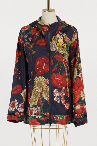 Gucci Zip-front Hooded Spring Floral-bouquet Print Nylon Jacket W/ Logo Patch In Multi
