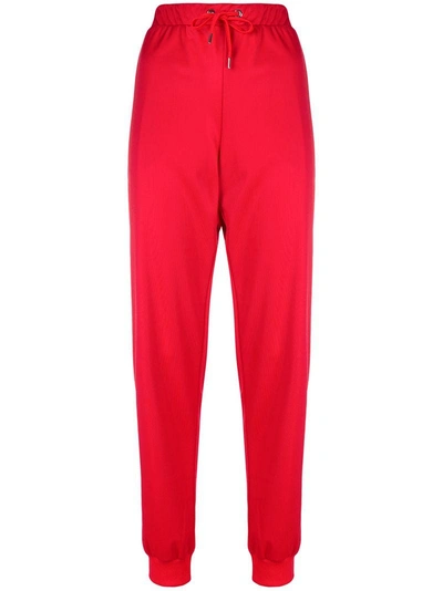 Shop Versace Logo Track Pants - Red