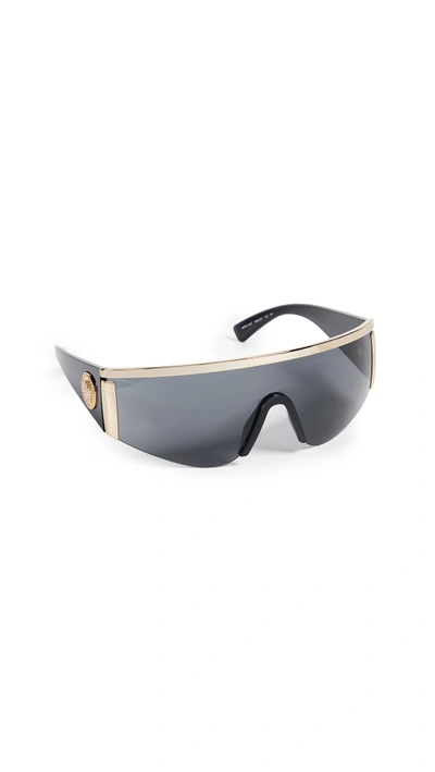 Shop Versace Ve2197 Shield Sunglasses In Gold/grey