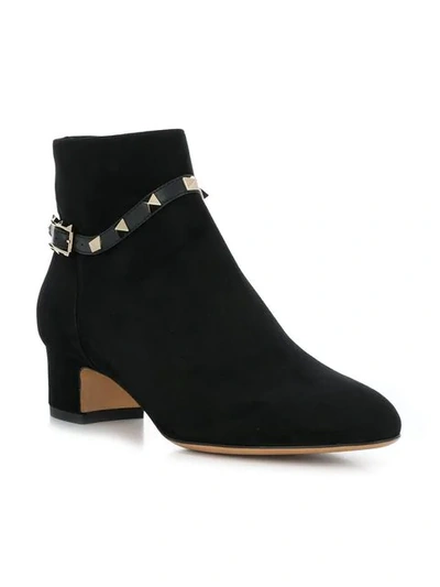 Shop Valentino Garavani Rockstud Strap Booties - Black