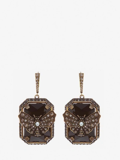 Shop Alexander Mcqueen Butterfly Earrings In Gold/black
