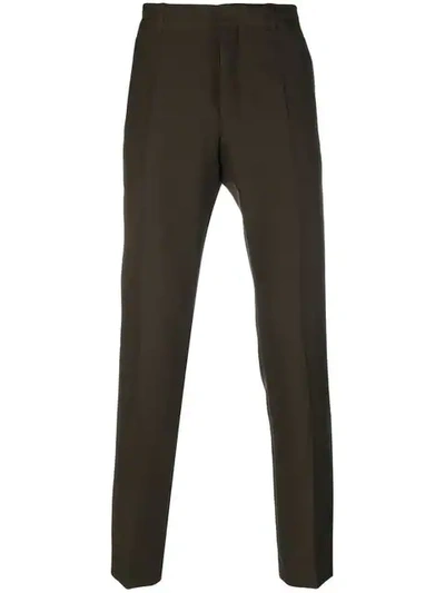 Shop Ann Demeulemeester Tapered Trousers - Brown