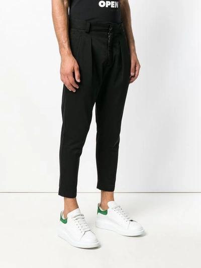 Shop Overcome Tapered Trousers In Black