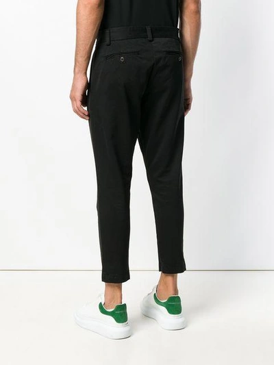 Shop Overcome Tapered Trousers In Black
