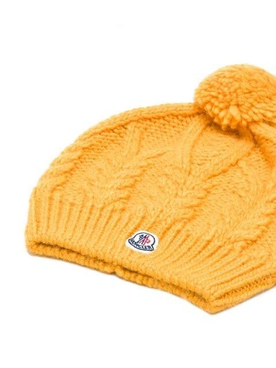 Shop Moncler Pom Pom Knitted Hat - Orange In Yellow & Orange