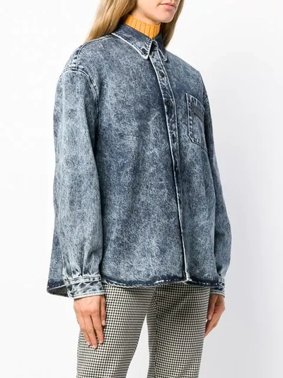 stained denim shirt
