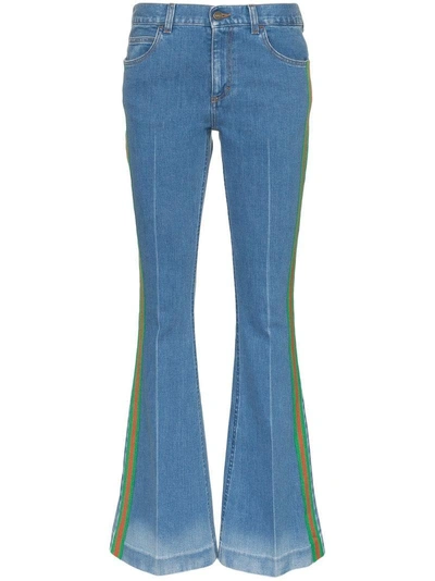 Shop Gucci Stripe Embellished Flared-leg Cotton Jeans - Blue