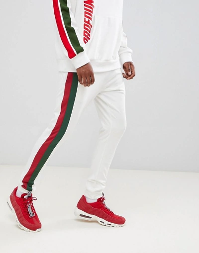 Shop Profound Aesthetic Stripe Panel Track Sweatpants In White - White