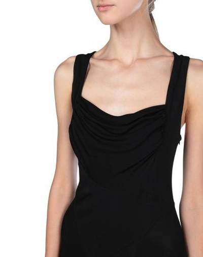 Shop Alaïa Long Dresses In Black
