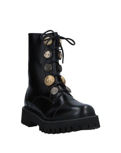 Dolce & Gabbana Embellished Glossed-leather Ankle Boots In Black