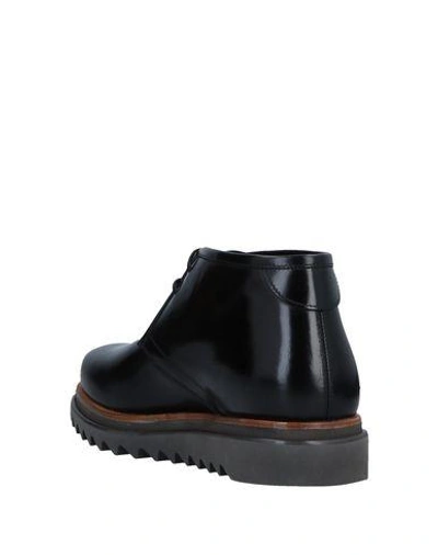 Shop Ferragamo Boots In Black