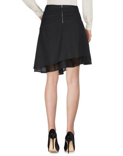 Shop Wunderkind Knee Length Skirt In Black