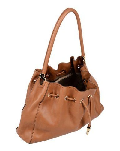 Shop Ferragamo Handbags In Brown