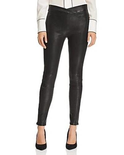 Shop Frame Crossover-waist Leather Pants In Noir