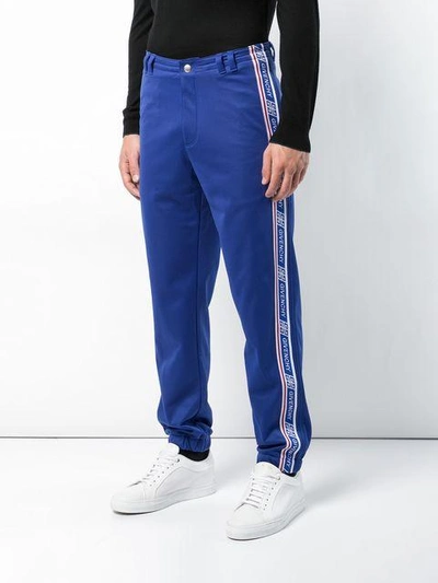 Shop Givenchy Logo Stripe Trousers - Blue