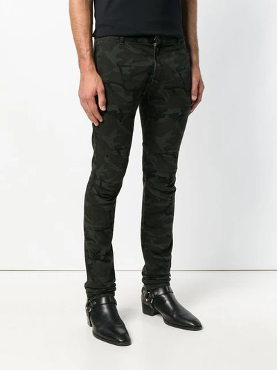 Shop Balmain Army Print Skinny Trousers - Black