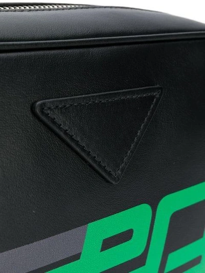 Shop Prada Printed Logo Crossbody Bag In Black