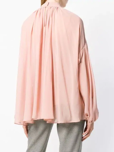 long-sleeve flared blouse