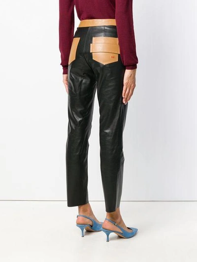 two tone leather trousers