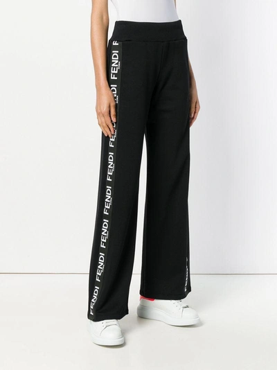 Shop Fendi Side Tape Flared Trousers In F0gme