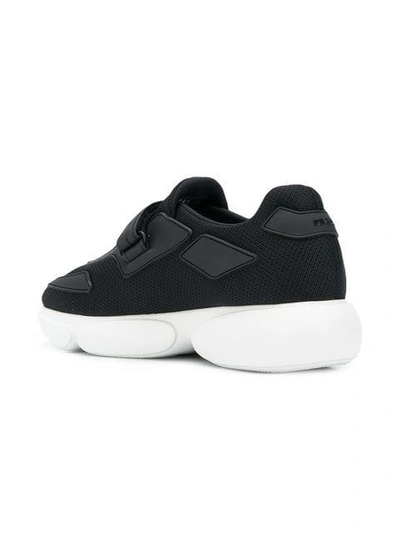 Shop Prada Cloudbust Sneakers - Black