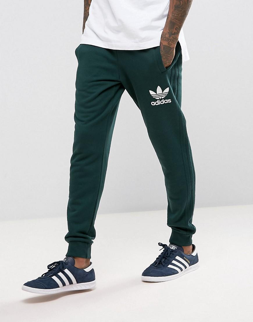 green adidas joggers