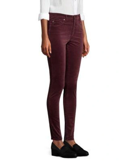 Shop Ag Farrah High-rise Velvet Skinny Pants In Rich Carmine