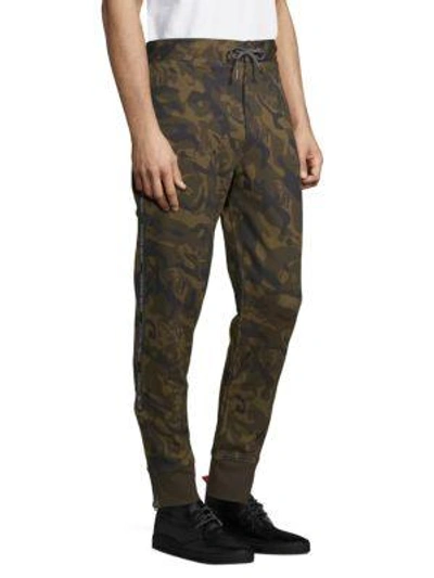 Shop Alexander Mcqueen Camouflage Sweatpants In Blue