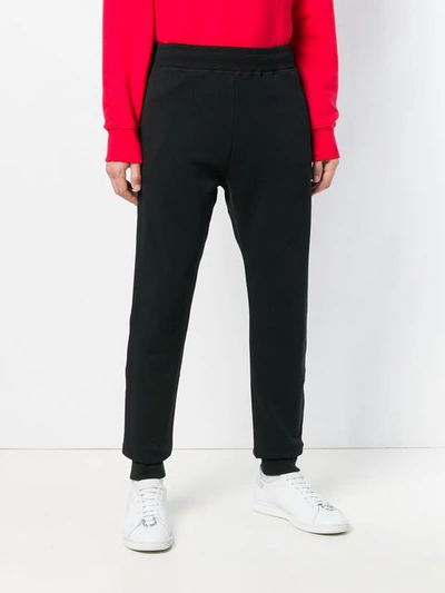 Shop Moschino Jersey Sweatpants - Black