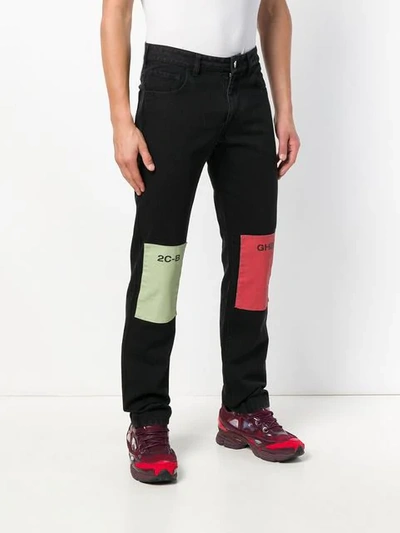 Shop Raf Simons Regular Trousers In Black