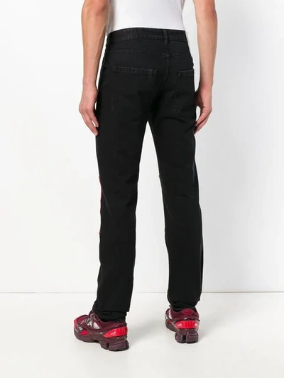 Shop Raf Simons Regular Trousers In Black