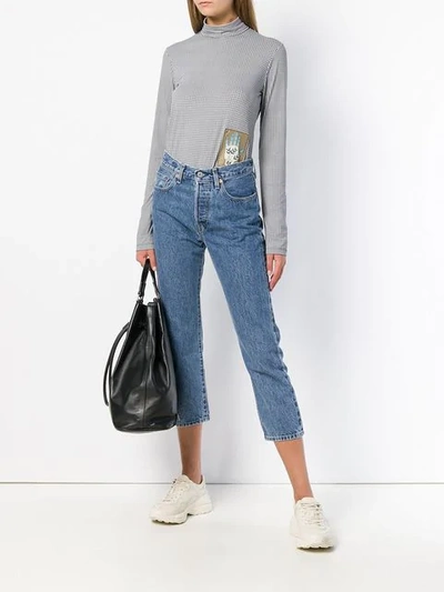 Shop Levi's Cropped Faded Jeans In Blue