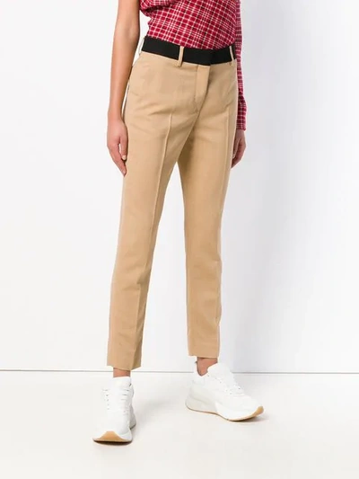 Shop Msgm Slim-fit Trousers In Neutrals