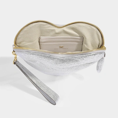 Shop Anya Hindmarch | Chubby Heart Clutch In Crinkled Metallic Silver Calfskin