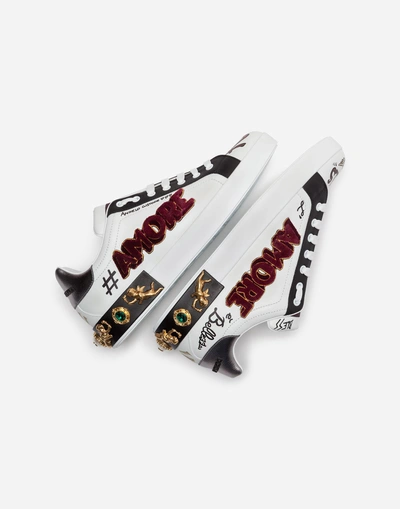 Shop Dolce & Gabbana Portofino Sneakers In Printed Calfskin With Patch And Appliqués In White