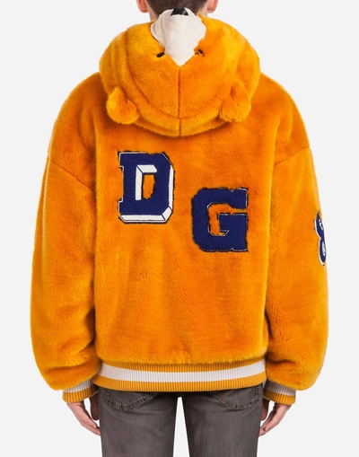 Shop Dolce & Gabbana Faux Fur Jacket With Hood And Patch In Orange