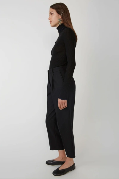Shop Acne Studios Pleated Trousers Black