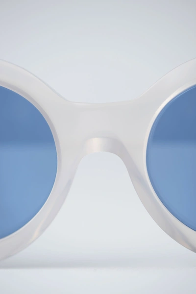Shop Acne Studios Oval Sunglasses White Clear/blue